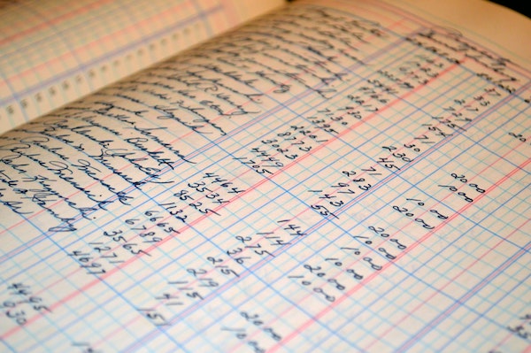 A hand-written
    accounting ledger.